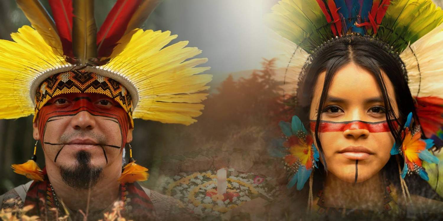 Chief Iskukua Yawanawá and his daughter Yawakanah in traditional headdress